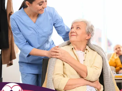 Caregiver providing personal care assistance
